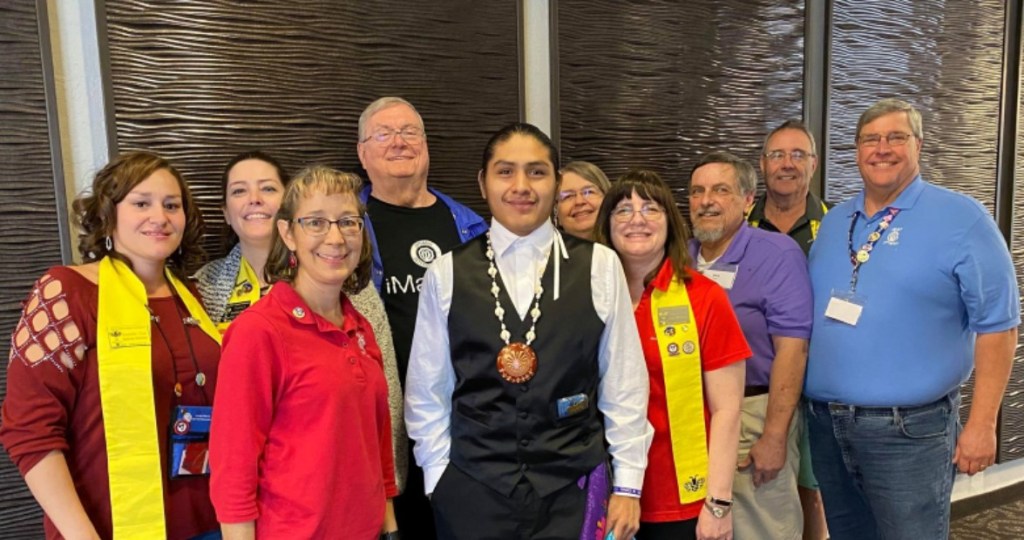 Photo of HEAT Club members with a student awardee