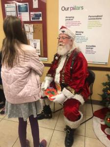 Visit from Santa during the annual shopping spree at Kohl's
